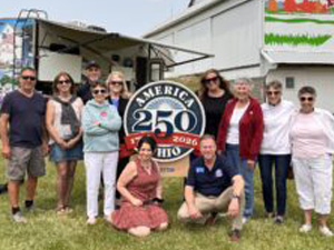 Photo, the extended Rice family along with Todd Kleismit and AM 250-OH commissioner Kathy Dean-Dielman